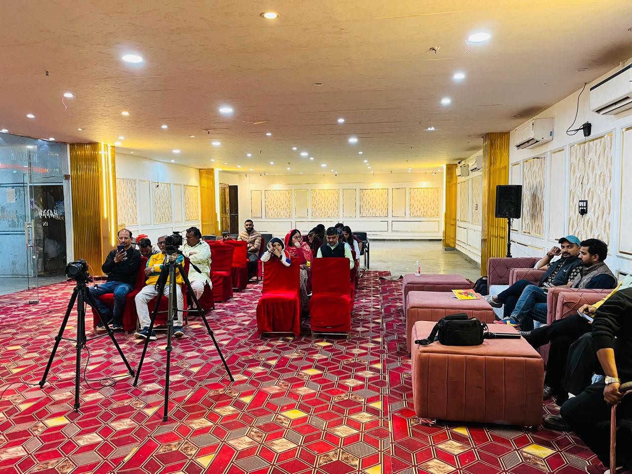 Indoor venue setup for a Bundeli Bawra cultural session