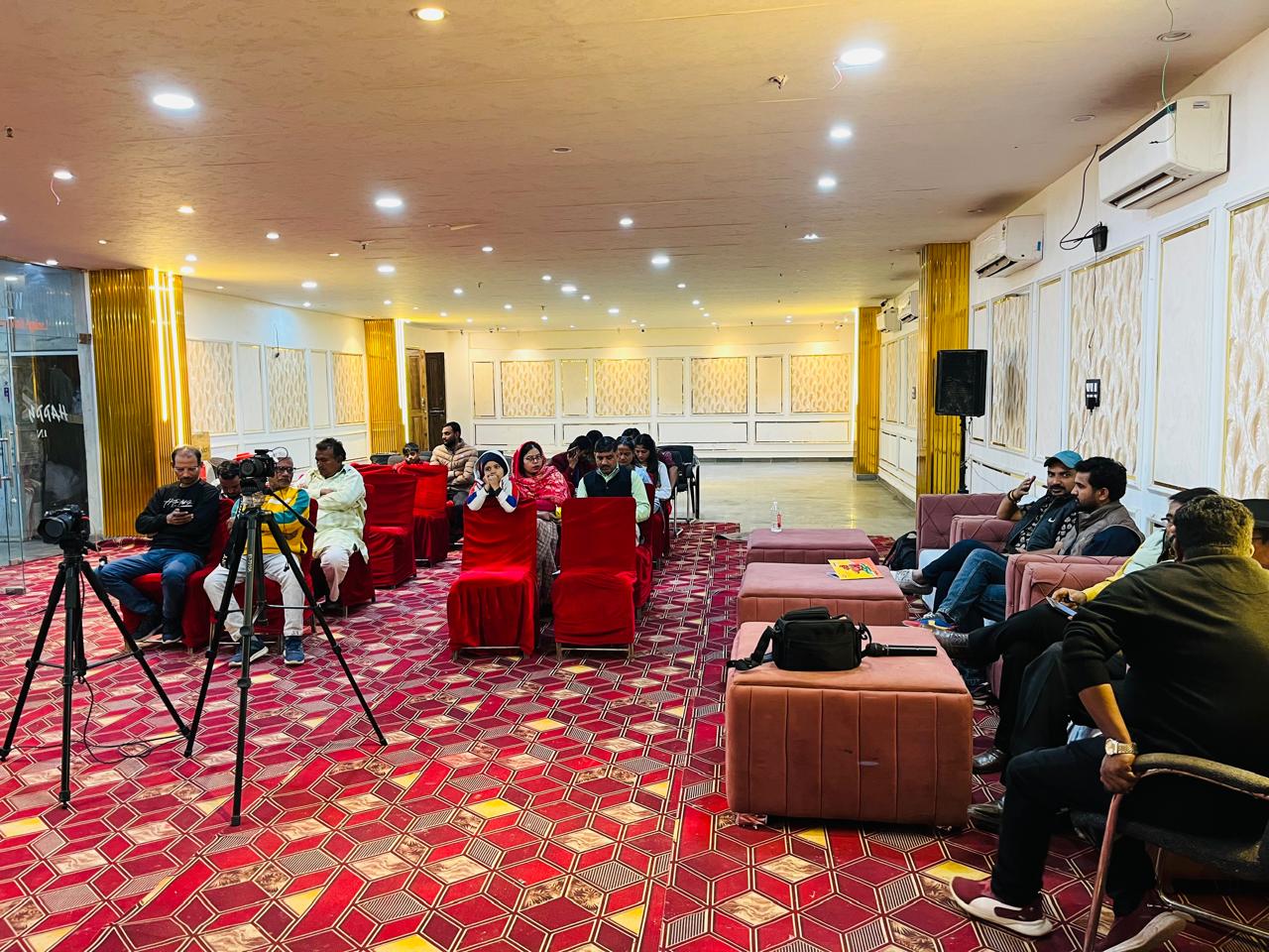 Participants seated during an indoor Bundeli Bawra cultural session
